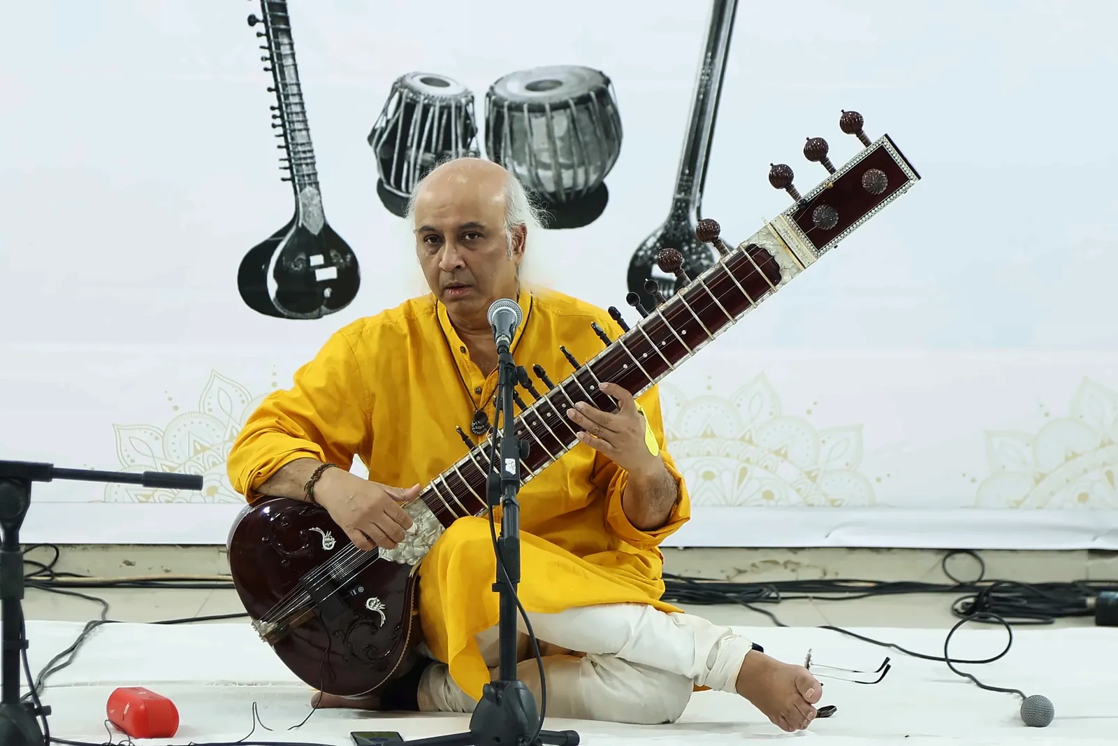 Vatsal Dave playing sitar and looking out toward the hall